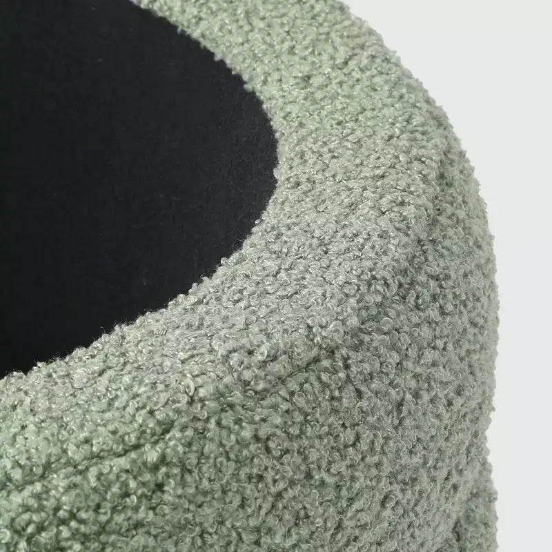 WestinTrends Alexandria Mid-Century Modern Faux Shearling Shearling Round Storage Ottoman